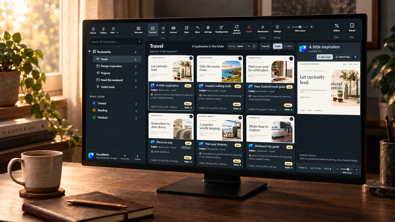 A warm desk and coffee beside a monitor showing the current charcoal VisualMark bookmark manager and its new stacked-bookmark icon.